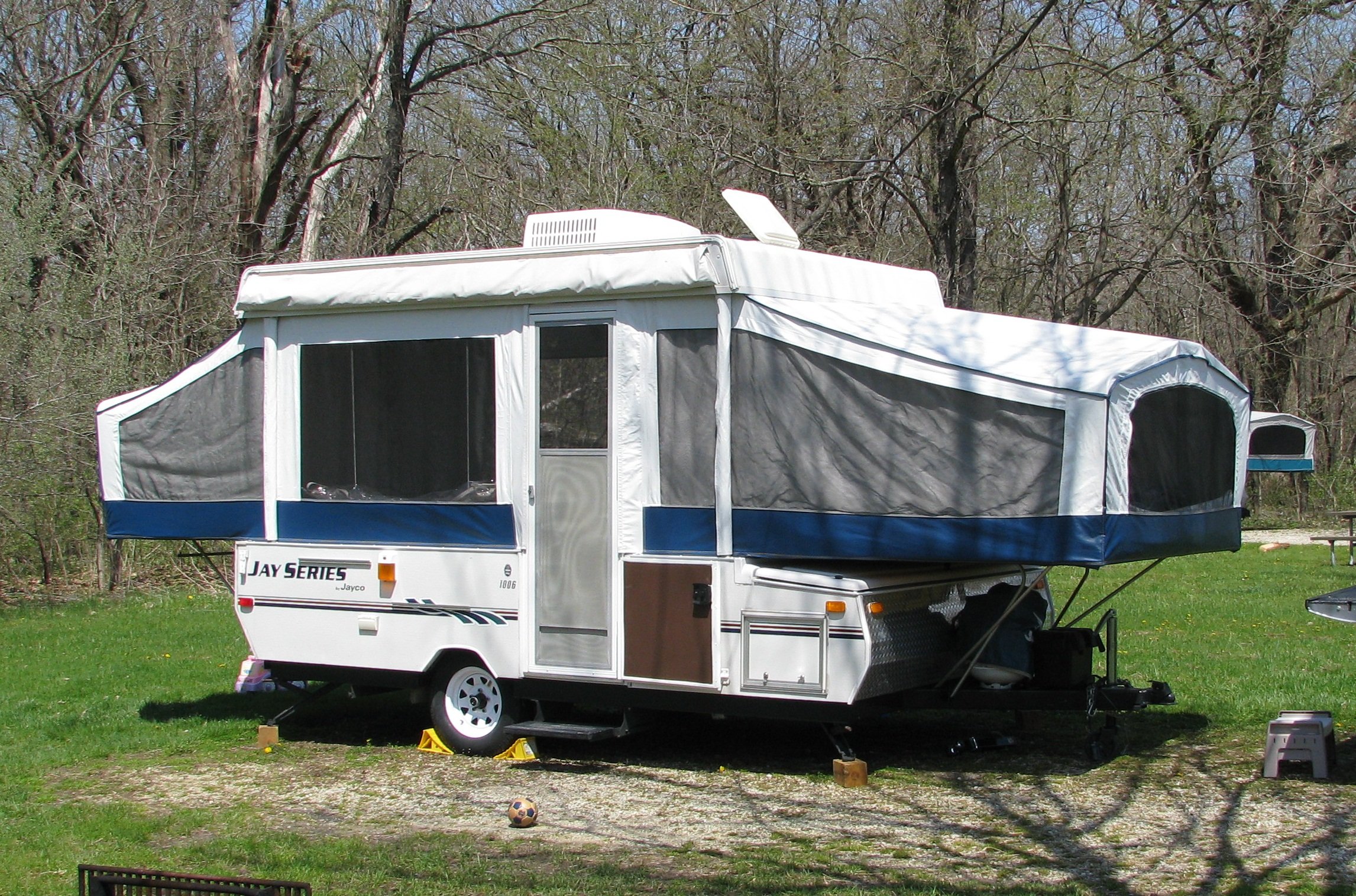 popup camper at campsite