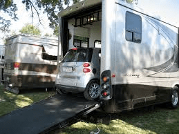 Toy hauler carrying a mini cooper