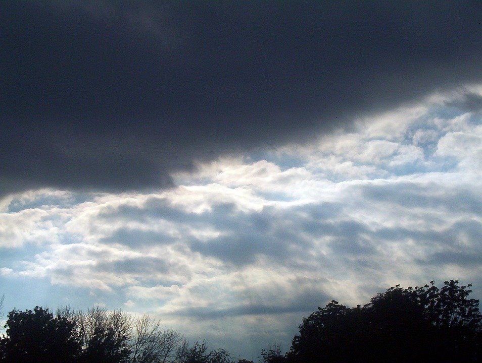 Dark clouds on a blue sky